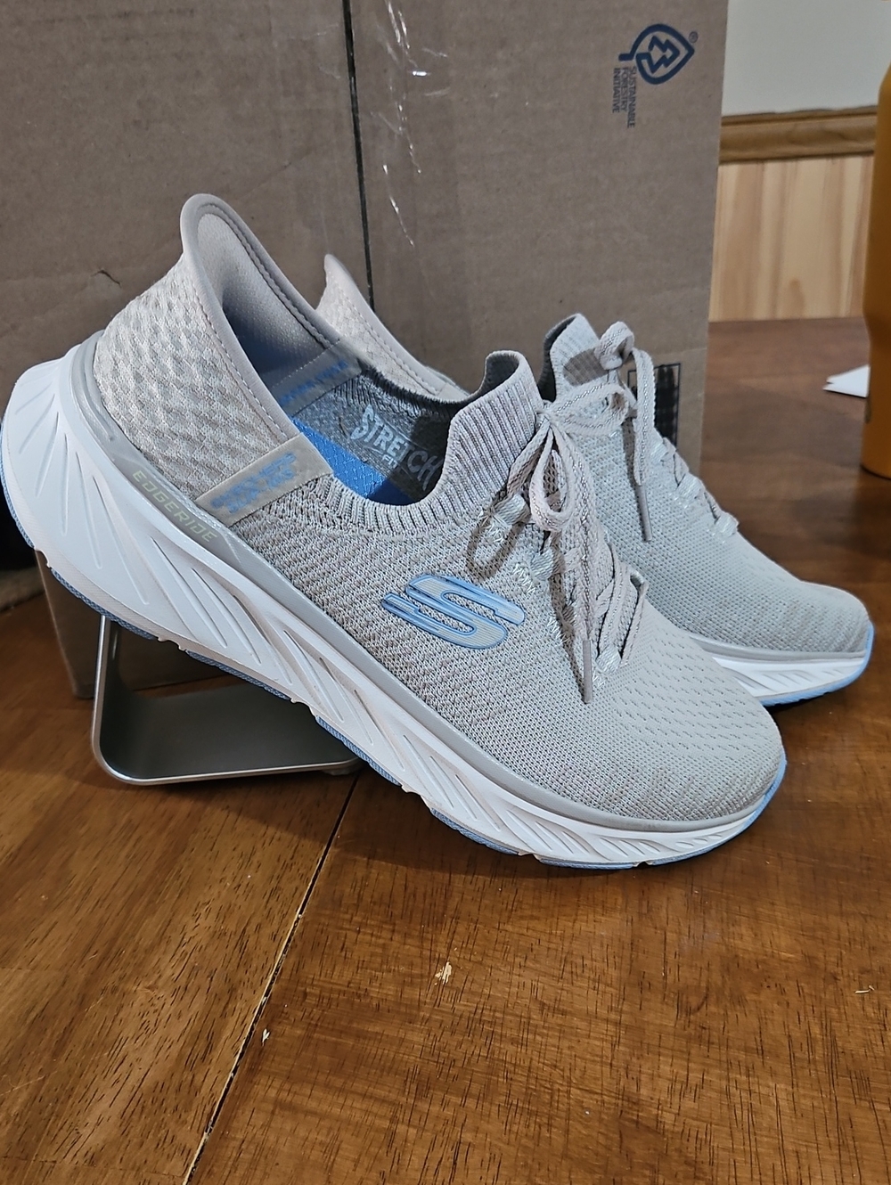 Skechers Ladies Knit Slip Ins Athletic Sneakers in Light Gray with Blue Logo